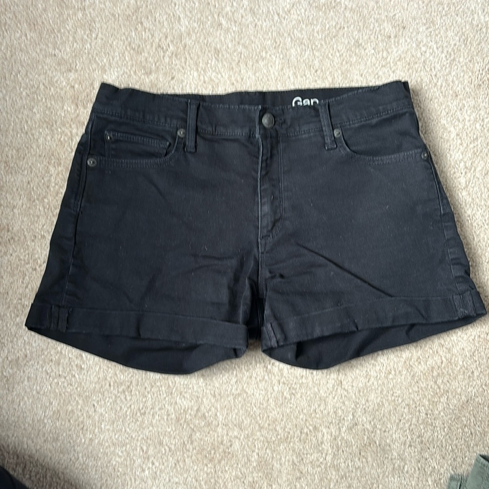 Black denim shorts, cuffed